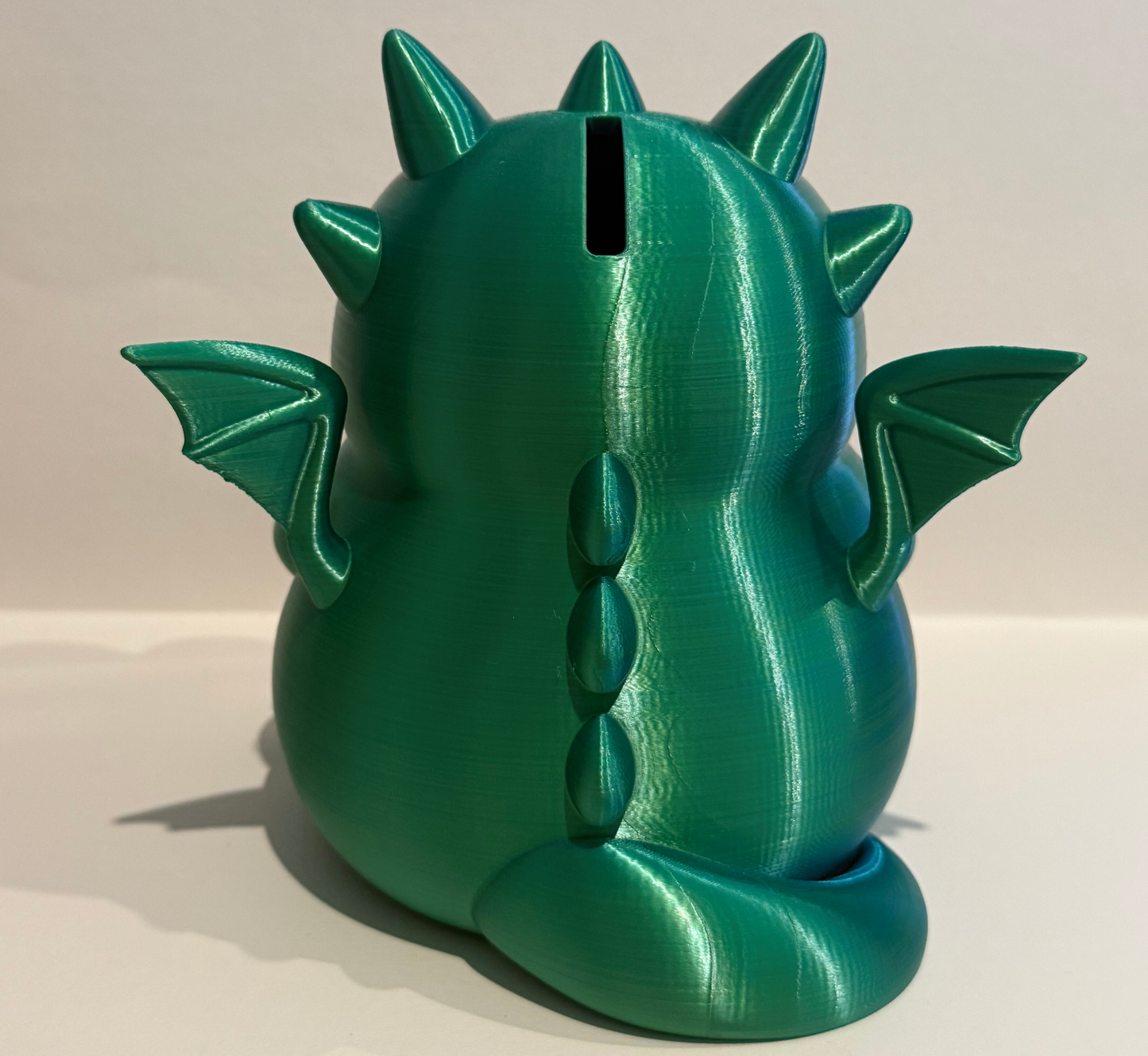 Spardose–Drachen mit beweglichen Augen