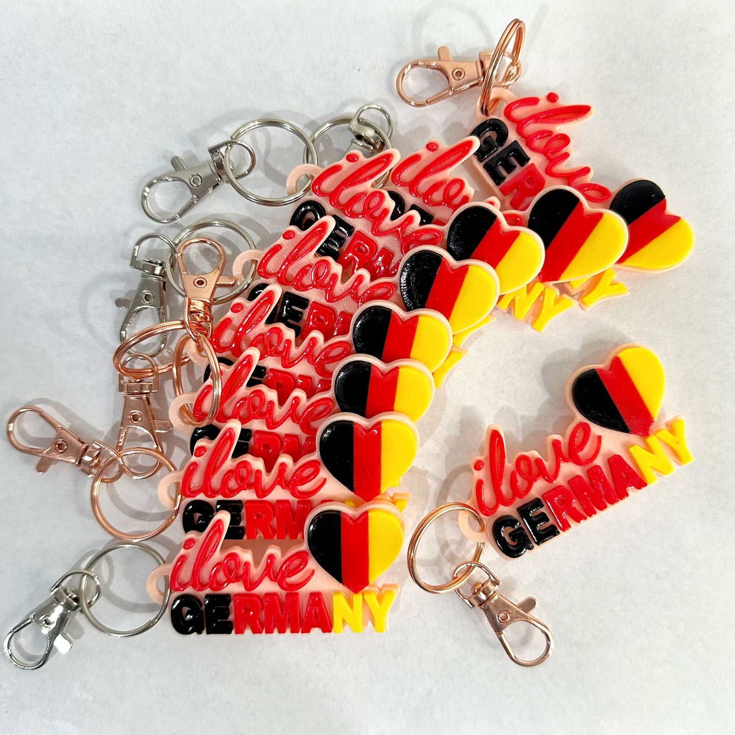 3 Stück Schlüsselanhänger mit „I love Germany“-Design – ideal als Geschenk, Souvenir oder persönliches Accessoire.