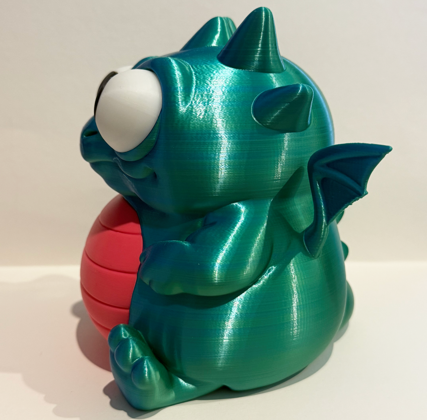 Spardose–Drachen mit beweglichen Augen